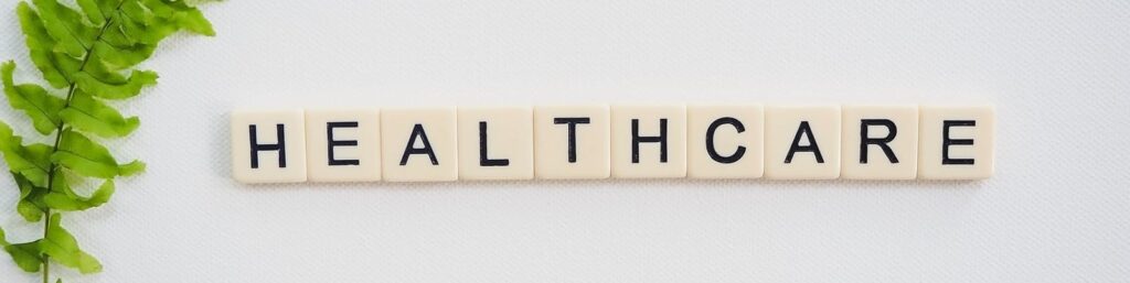 tiles spelling healthcare||Tiles spelling healthcare|tiles spelling healthcare|person at see through board|a robot|rubber bands|cyber security graphic|a handshake|a check list|a robot|a robot