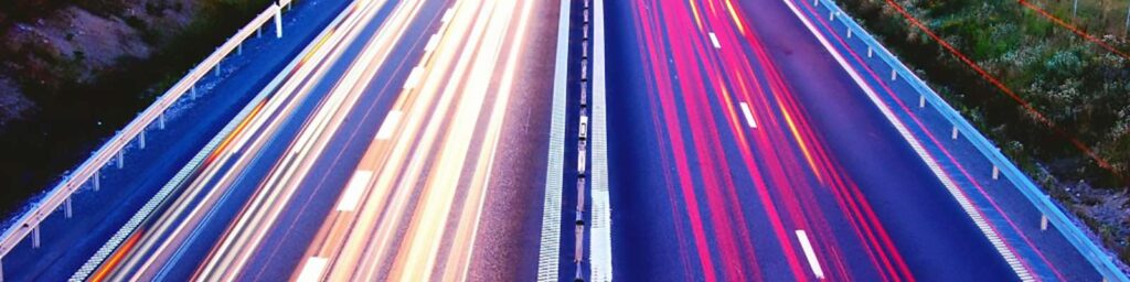 Car lights streaking down a motorway|Car lights streaking down a motorway